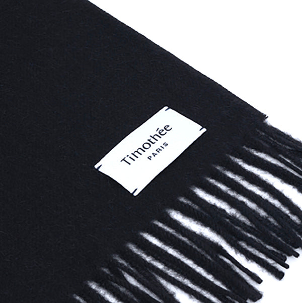 French contemporary artisan brand Timothee Paris black baby alpaca minimal scarf flat with logo