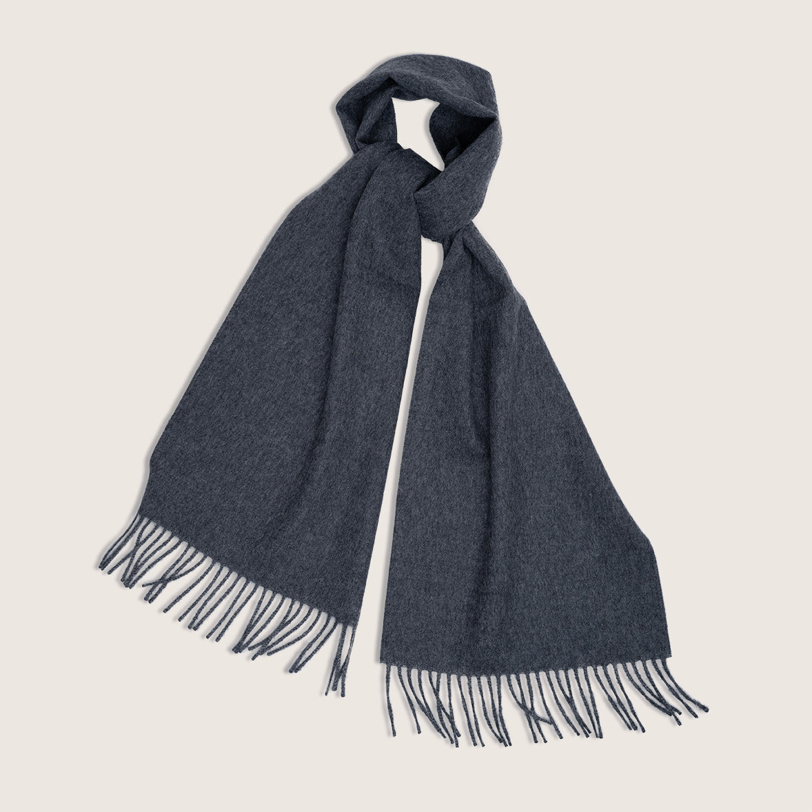 French contemporary artisan brand Timothee Paris dark grey clean baby alpaca scarf knotted