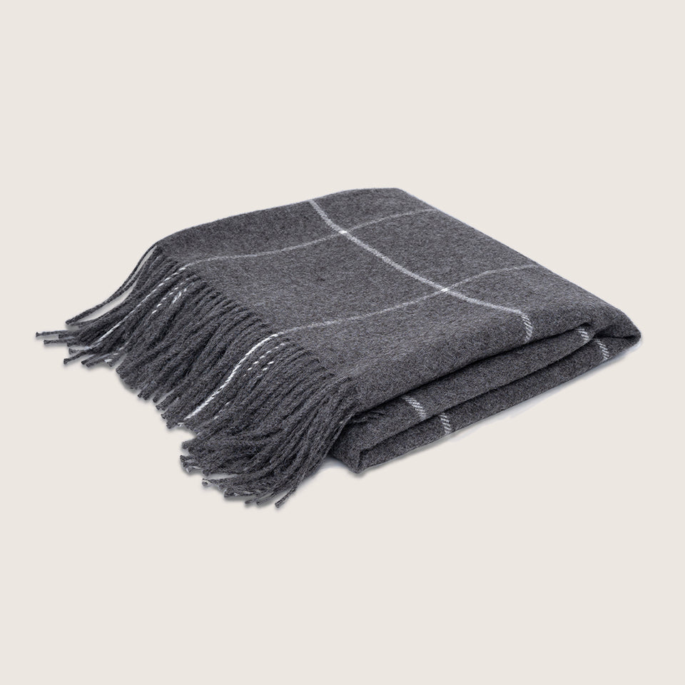 dark grey alpaca blanket by french-lifestyle brand timothee paris quarter view