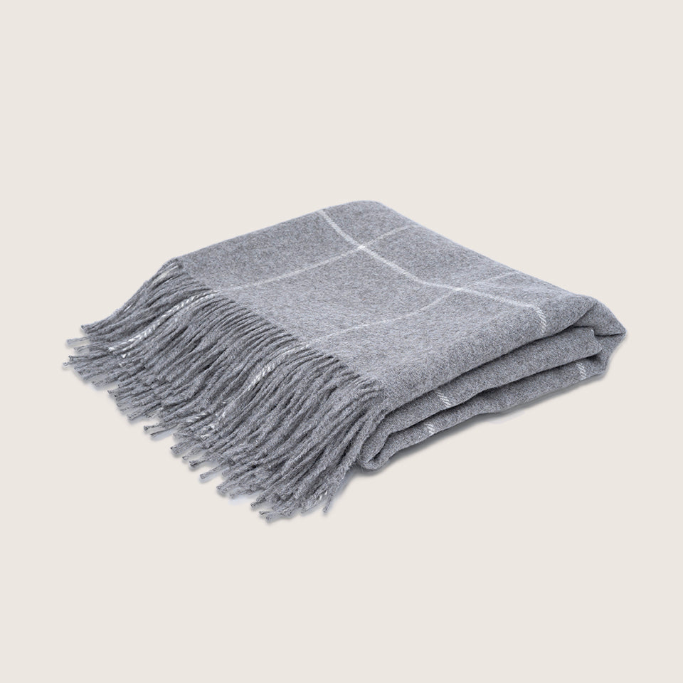 light-grey alpaca blanket by french-lifestyle brand timothee paris quarter view