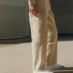 french sneaker atlantique cloud worn by a model with beige trousers