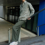 Timothee paris sneaker cabourg cotton white worn by a man with grey shirt and trousers