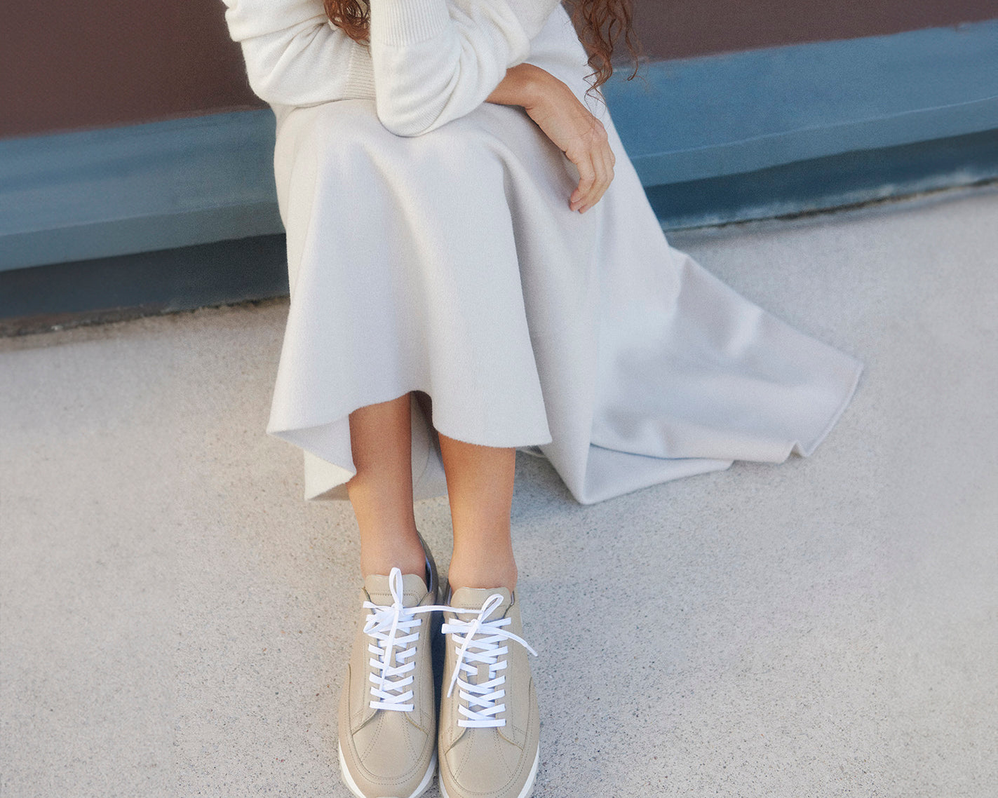 French sneaker brand timothee paris cabourg cloud taupe color worn with ivory skirt