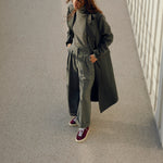 Timothee paris sneaker Atlantique sustainable suede mahogany red worn with grey trousers