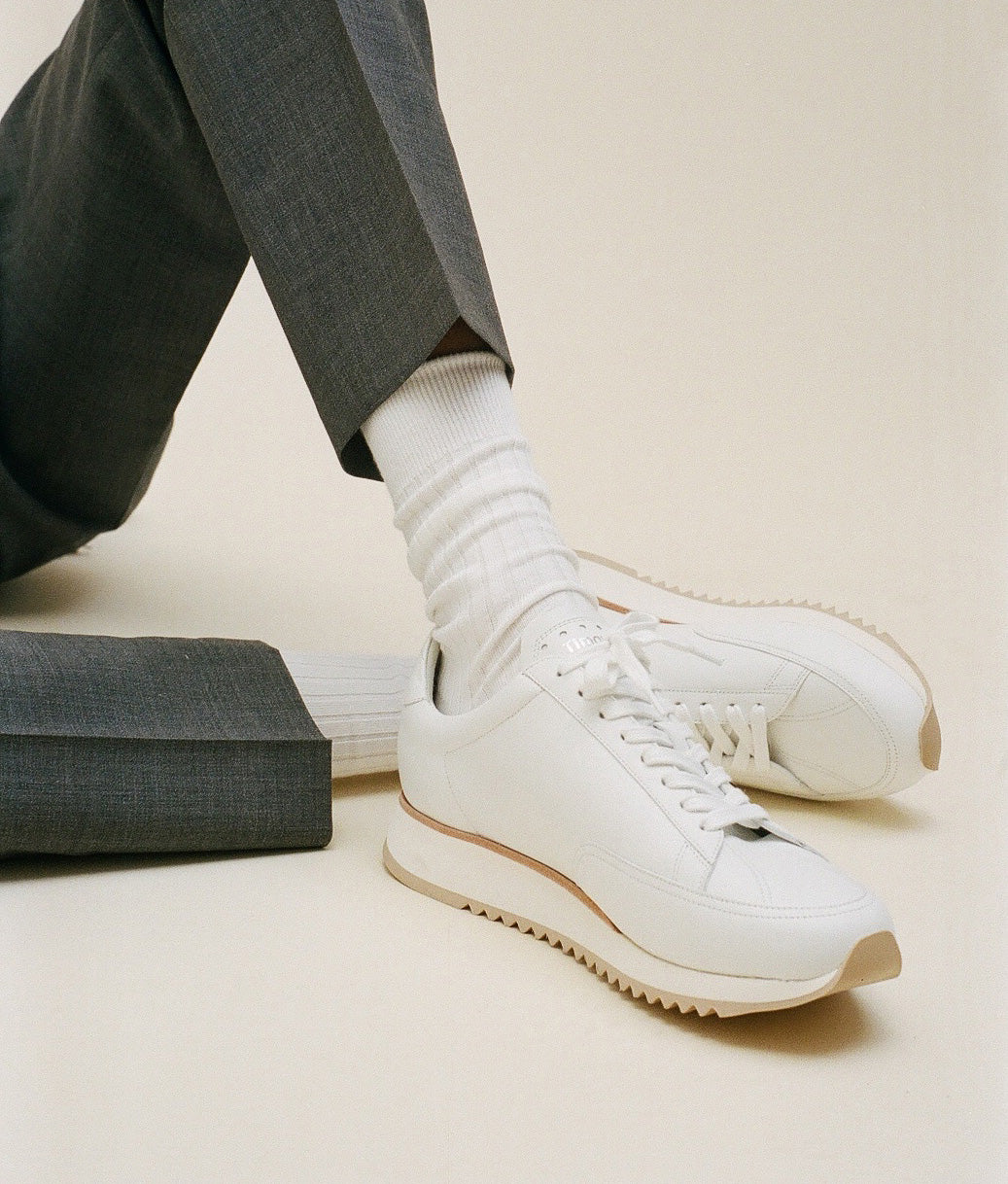 Timothee paris sneaker cabourg white worn with grey trousers 