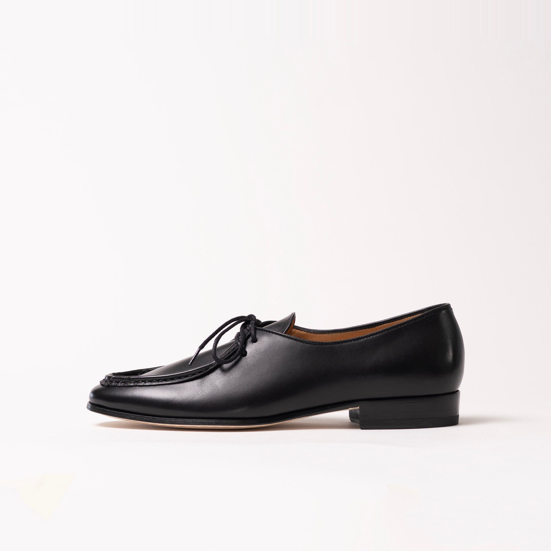 Timothée Paris Fixin black calf leather lace-up loafer with moccasin apron toe, side profile