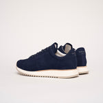 Back view of the Cabourg sneaker in navy blue by Timothée Paris, showcasing supple handcrafted leather and refined minimalist construction.