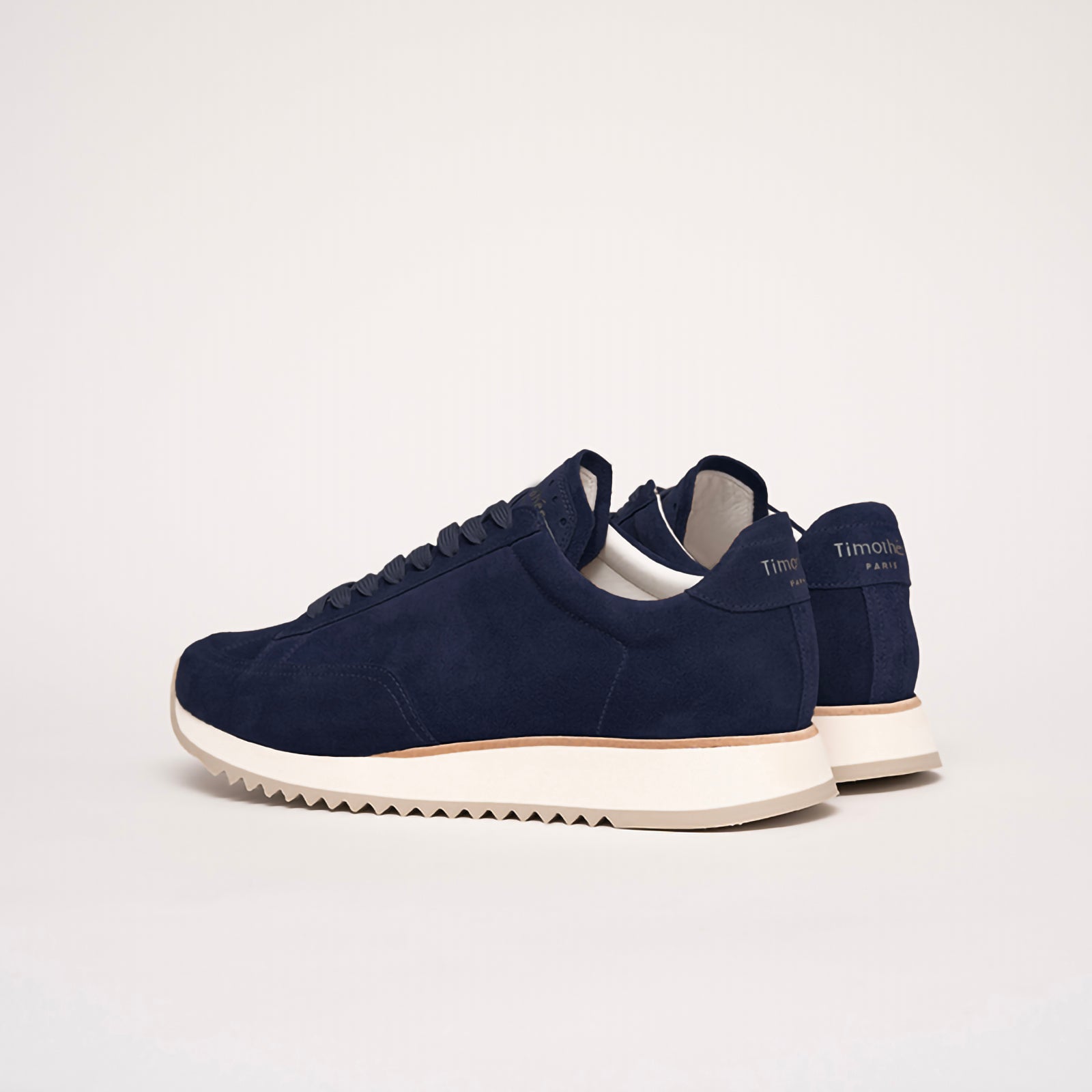 Back view of the Cabourg sneaker in navy blue by Timothée Paris, showcasing supple handcrafted leather and refined minimalist construction.