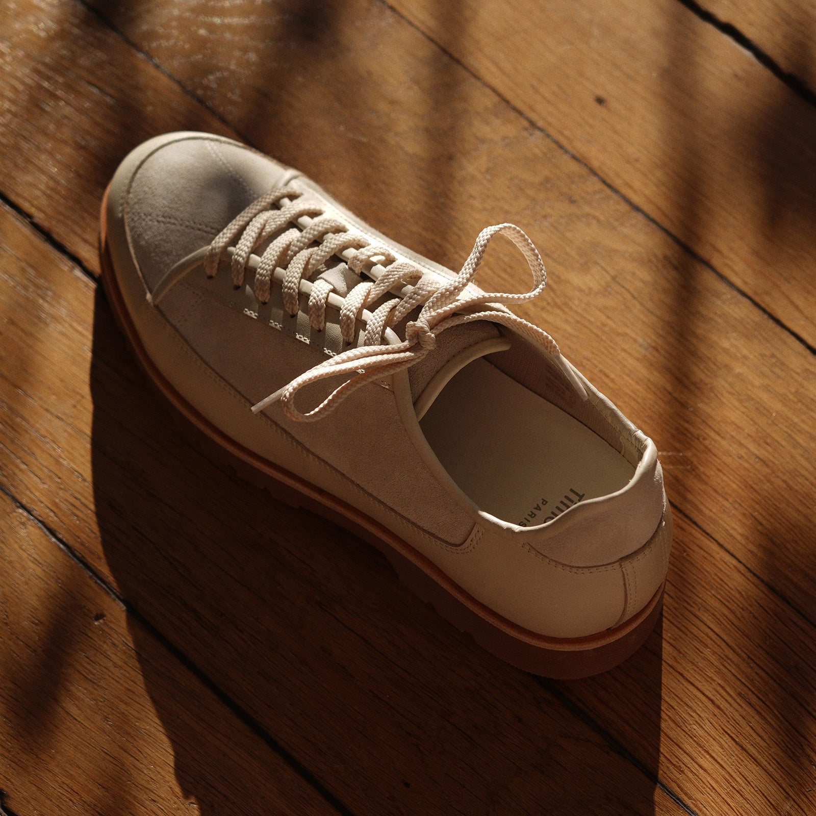 Timothee Paris Yport  shoe on a wooden floor