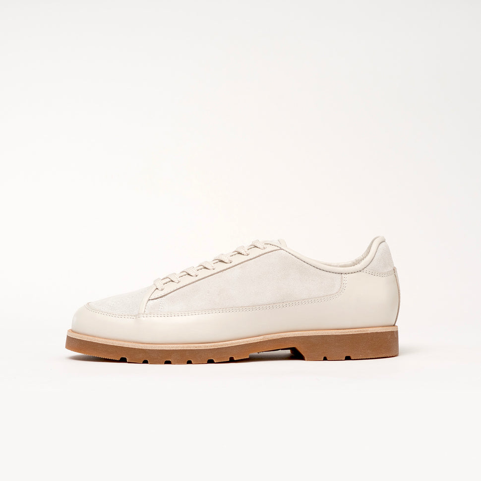 Timothée Paris White leather shoe yport with brown sole on a white background