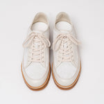 Pair of Timothee Paris Yport shoes on a light gray background