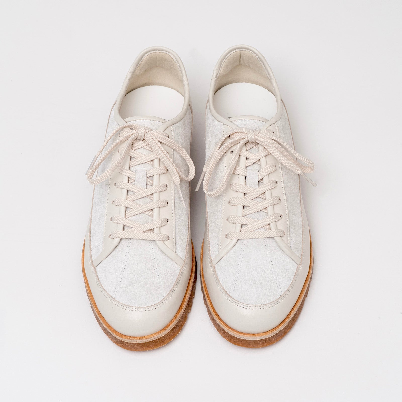 Pair of Timothee Paris Yport shoes on a light gray background