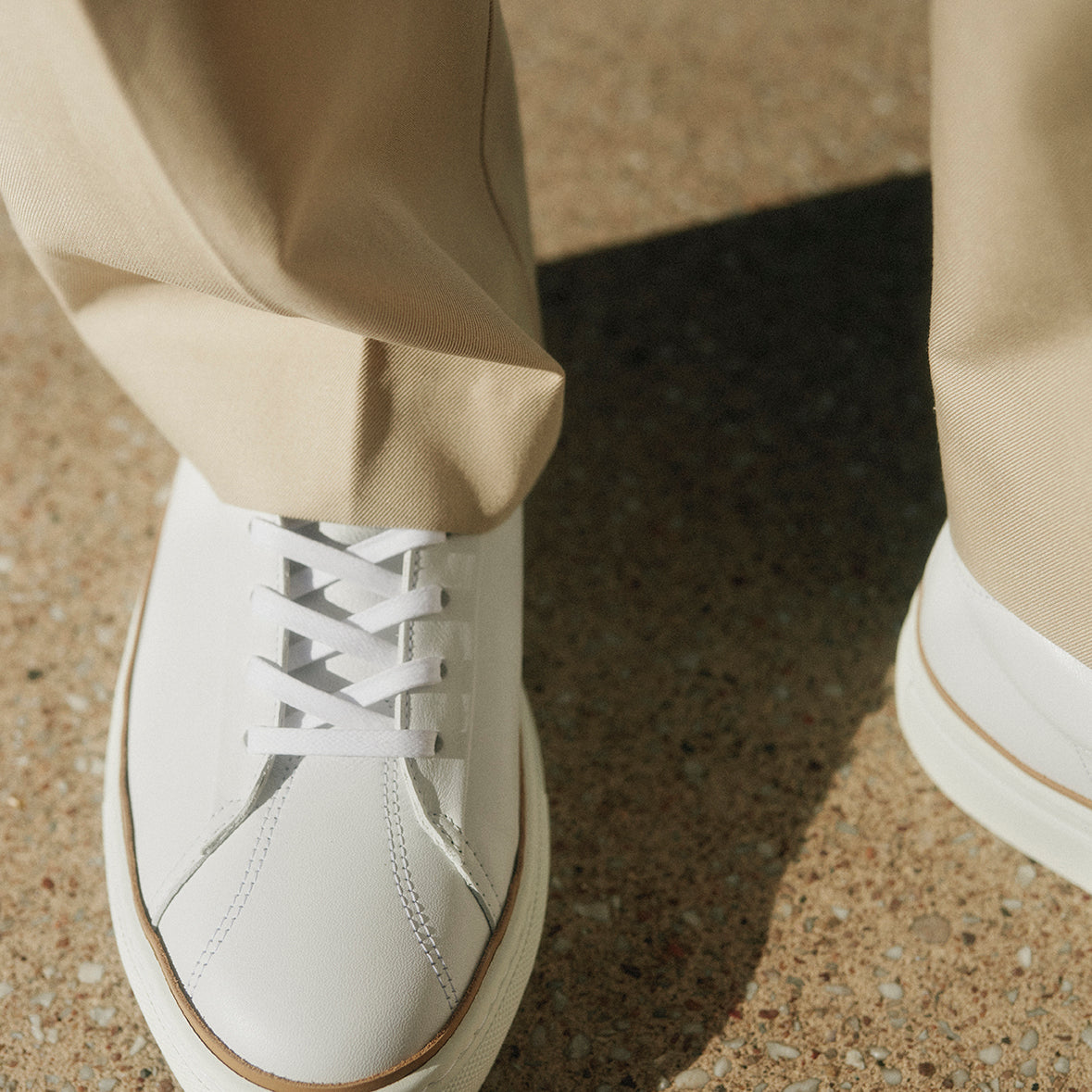 french white sneaker ATLANTIQUE cloud by Timothee Paris matched with beige chino trousers