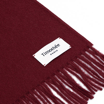 French contemporary artisan brand Timothee Paris bordeaux baby alpaca minimal flat with logo tag