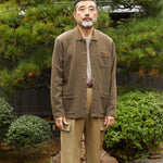 Japanese brand IKIJI cardigan wool cotton jacket olive green with beige wool cargo pants image photo
