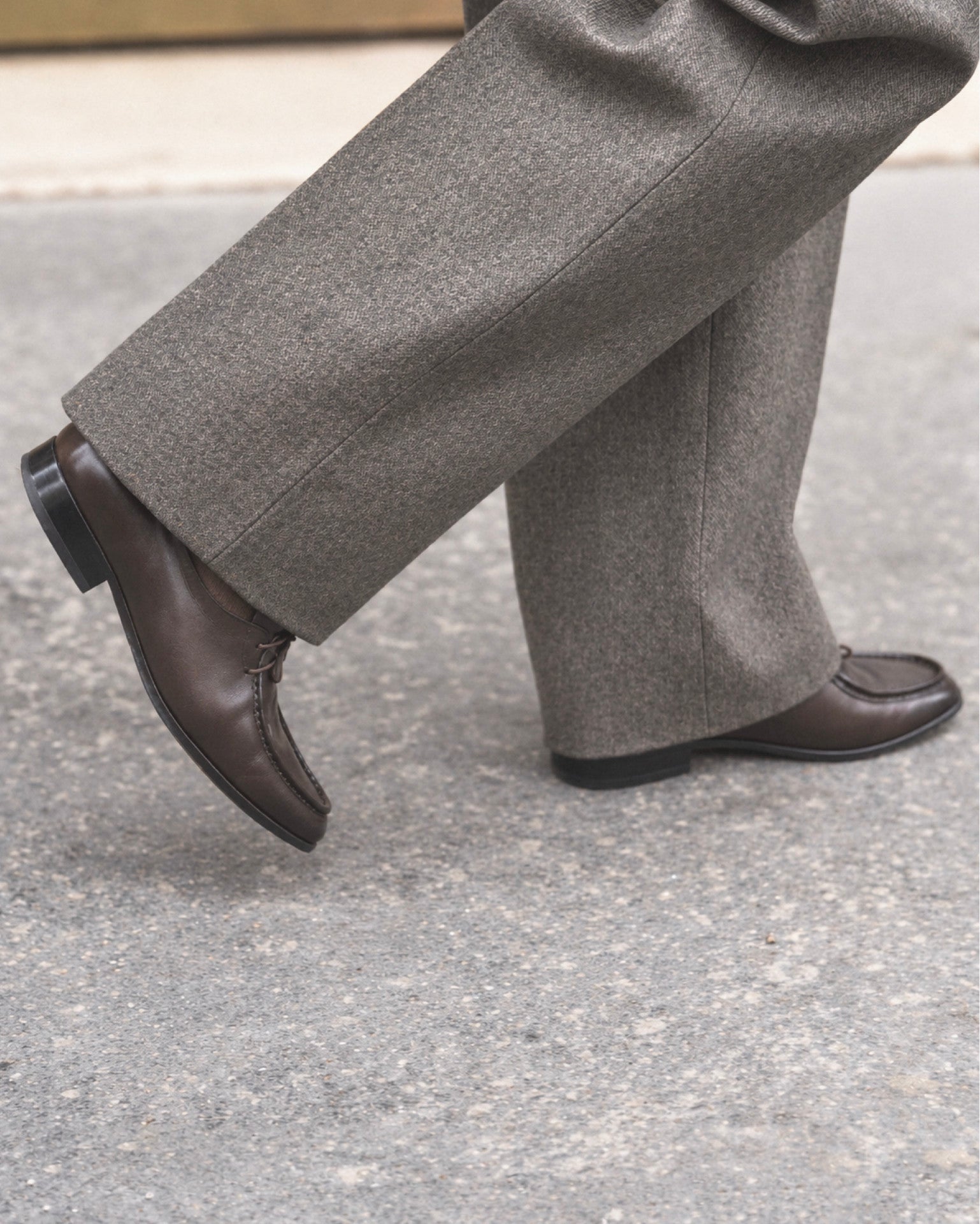 Timothee Paris Fixin loafer paired with grey wool trousers
