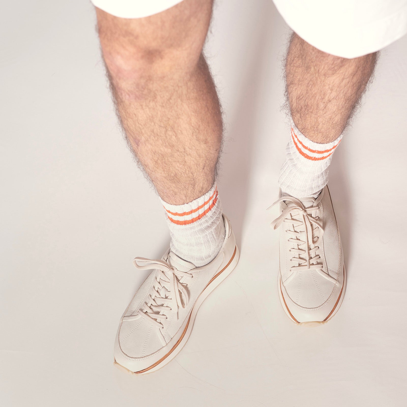 Timothée Paris handcrafted sneakers LOUVIEleather and suedeRS with thick sole in chalk white