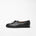 Side view of Beaune loafers in black pebbled leather by Timothée Paris, emphasizing its clean silhouette and subtle refinement