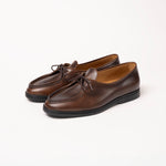 Three-quarter view of Beaune loafer in Cognac pull-up leather by Timothée Paris, showcasing the shoe’s elegant form and handcrafted details.