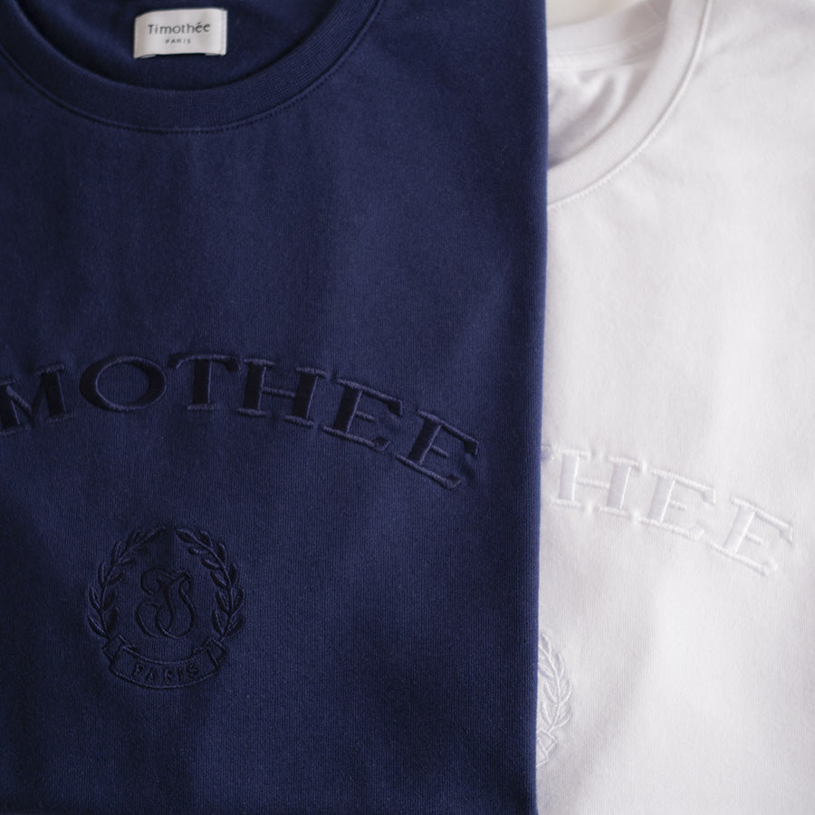 navy-&-white-short-sleeve-embroidered-timothee-paris-monogram-logo-oversized-tshirt-detail-closeup-two-tones