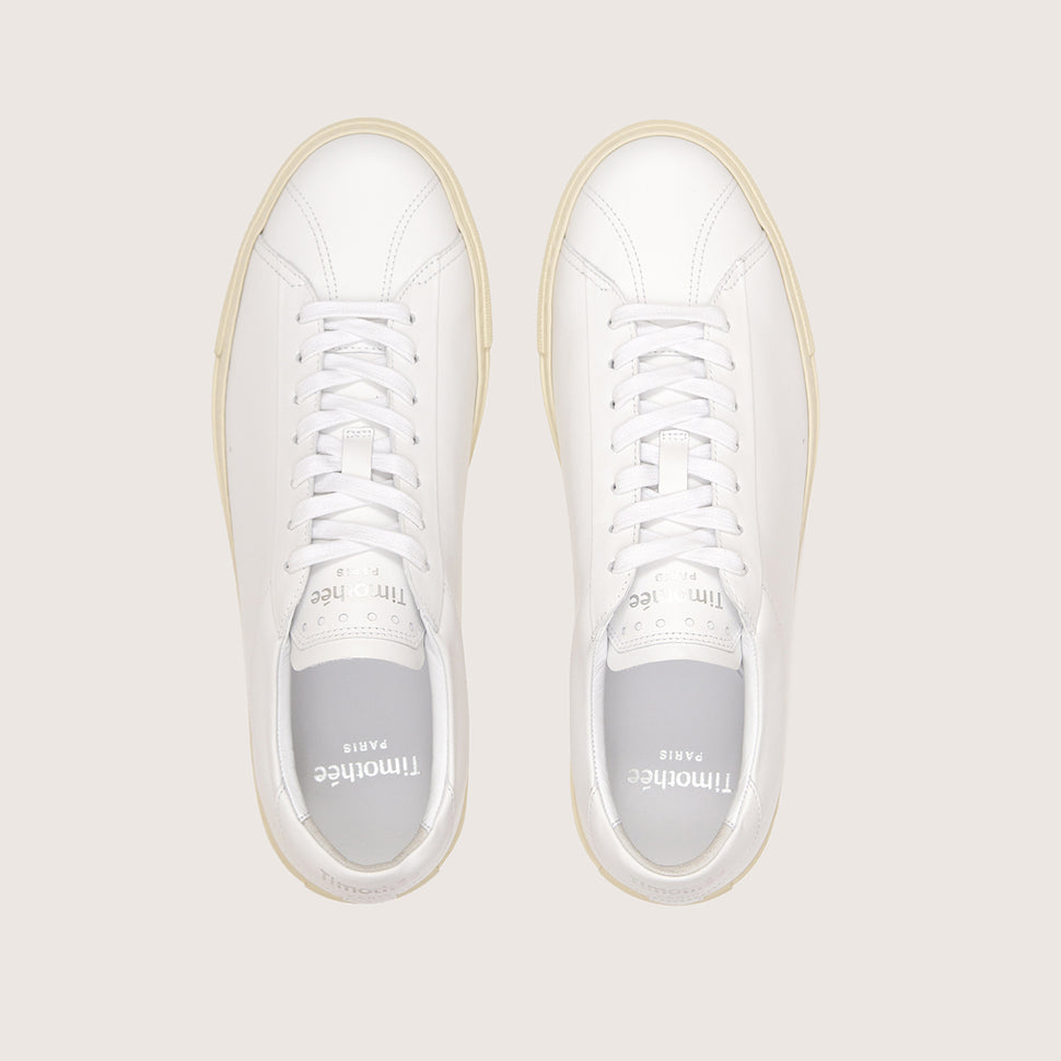 clean white sneaker atlantique by fench brand timothee paris top view  photo