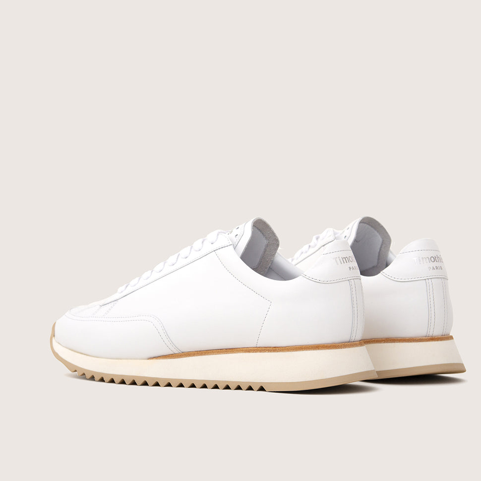 clean white handcrafted sneaker cabourg by french brand timothee paris back view